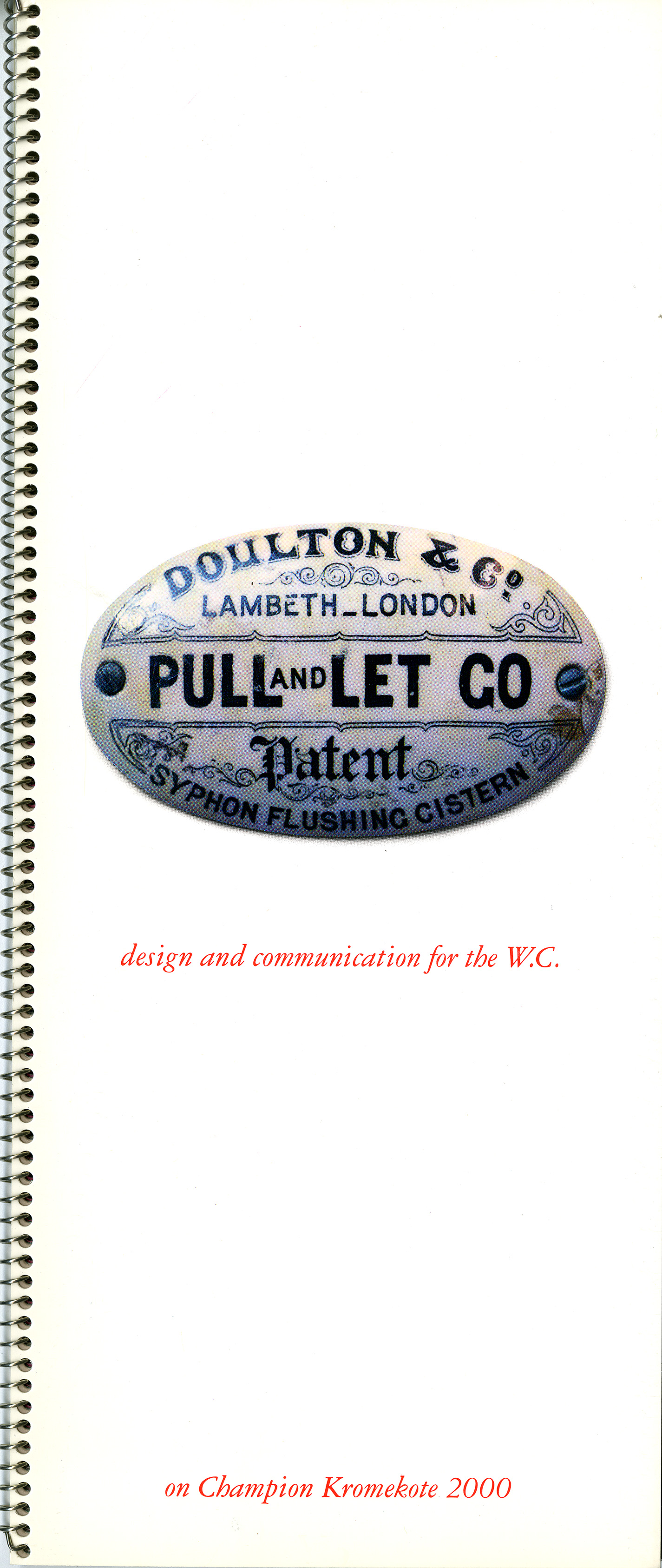Old toilet sign on ceramic plate